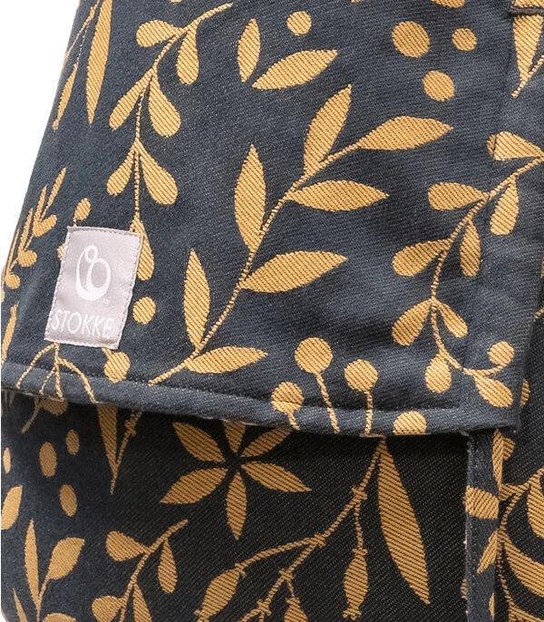 Portabebés Stokke® Limas™ Plus Dorado Floral (4 kg a 18kg)